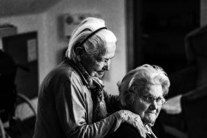 Older women dancing or sitting